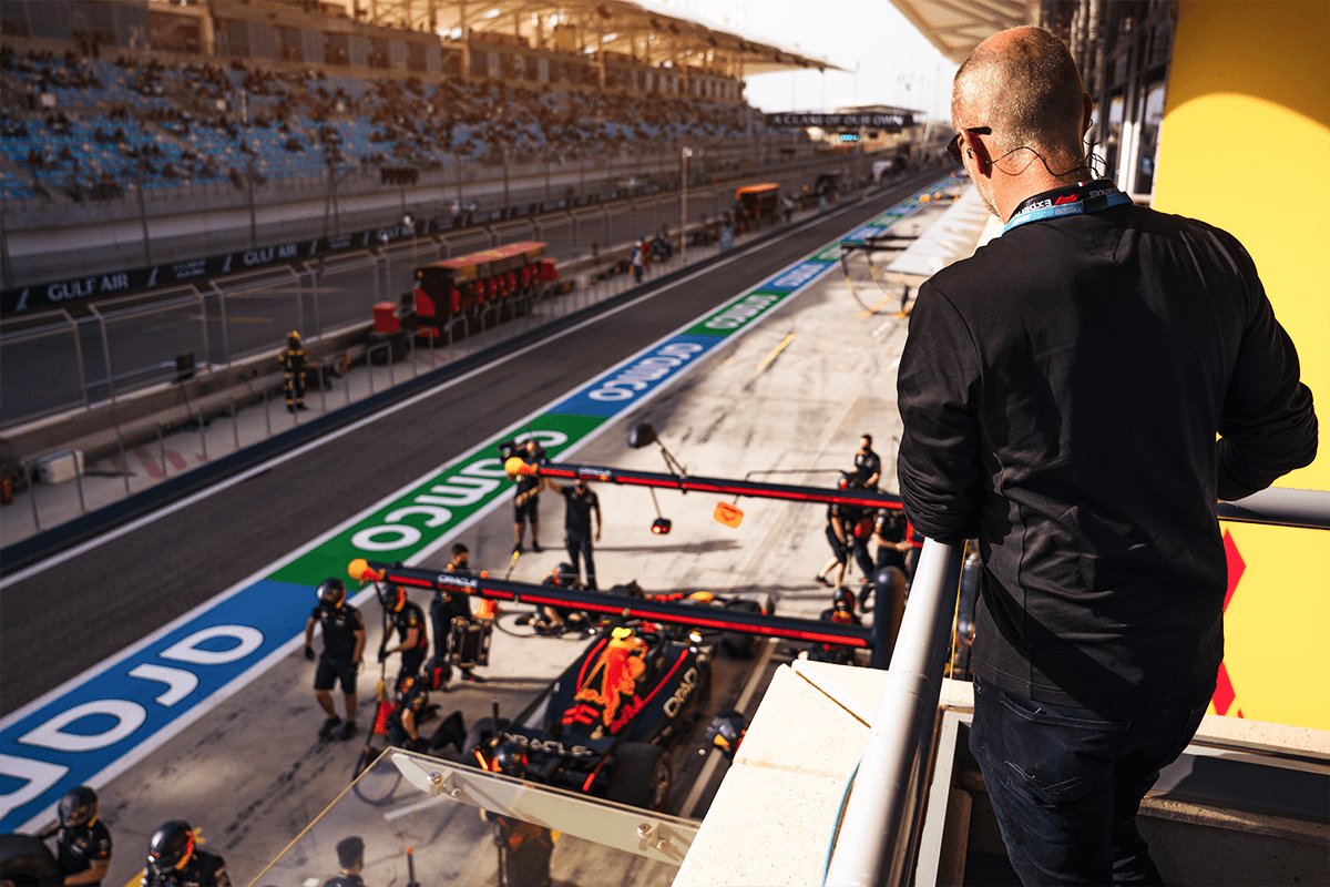 Watching a pit stop from the paddock balcony